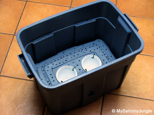 Self watering storage tote